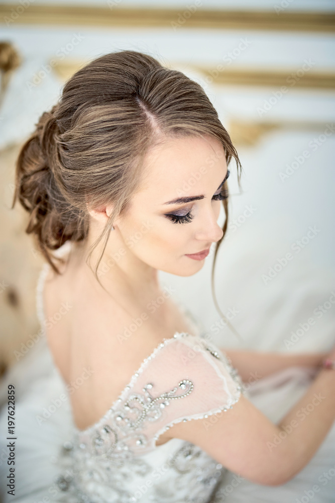 Fashionable model Bride.Young with perfect skin and make-up, white background