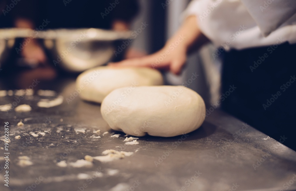 Woman preparing yeast dough Woman preparing yeast dough