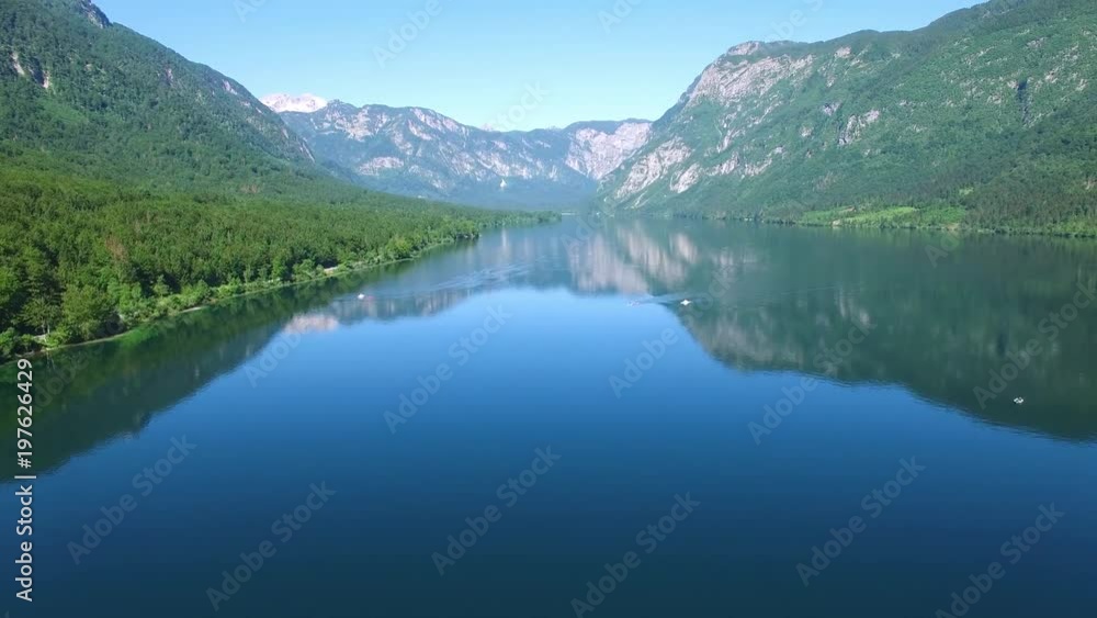 AERIAL VIEW: flight over Bohinj lake, camera moving forwards .Triglav National Park AERIAL VIEW: flight over Bohinj lake, camera moving forwards .Triglav National Park