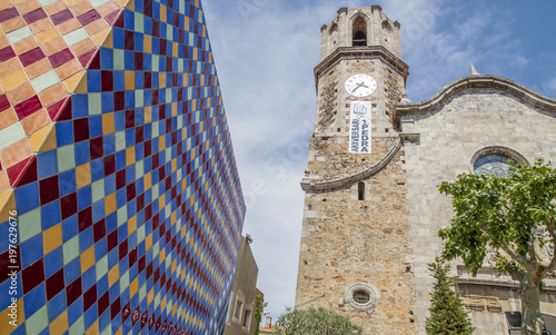 Village view, church, iglesia Sant Nicolau, baroque style,Malgrat de Mar,province Barcelona,Catalonia. photo