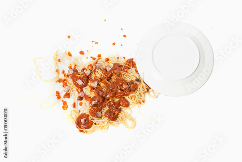 A fallen dish of pasta on the floor photo