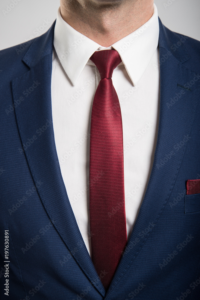 Close-up of business man wearing suit and tie Close-up of business man wearing suit and tie