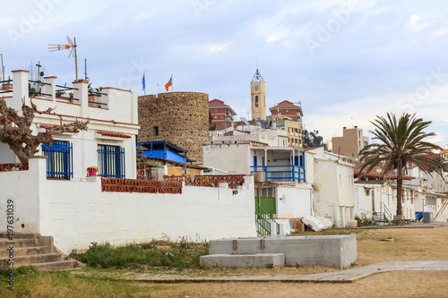 Village view,beach and tower in Montgat,Catalonia,Spain.