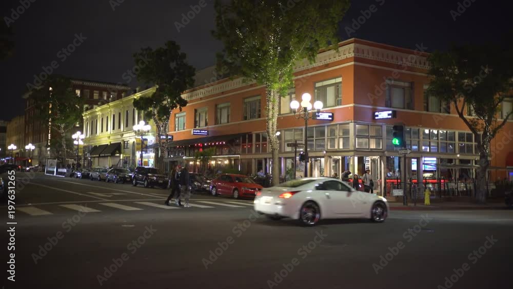 Buildings located on F Street at night Buildings located on F Street at night