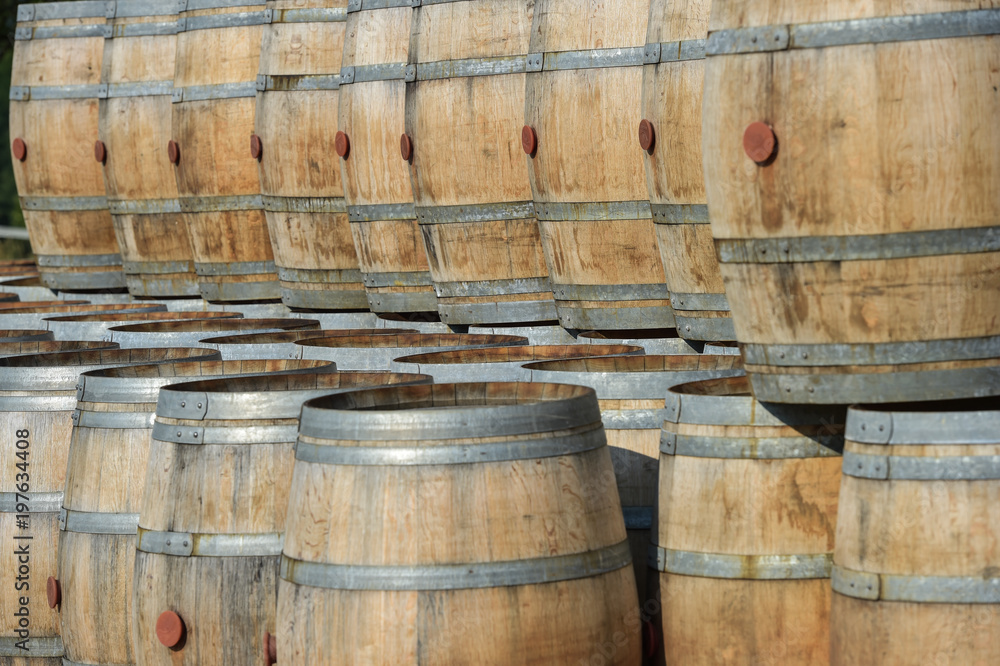 Storage of old barrels in a castle of Bordeaux vineyards