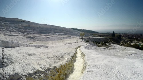 Famous place travertine terraces and pool in Pamukkale at Turkey.