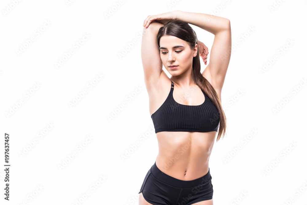 Young beautiful woman in fitness wear over white background Young beautiful woman in fitness wear over white background