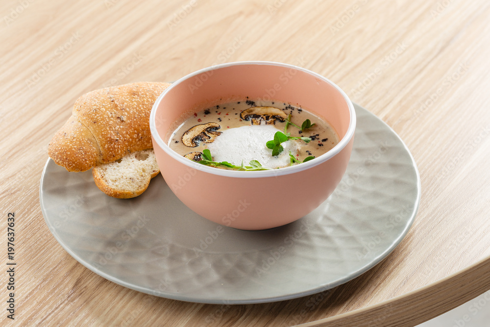 Mushroom cream soup and champignon in bowl Mushroom cream soup and champignon in bowl