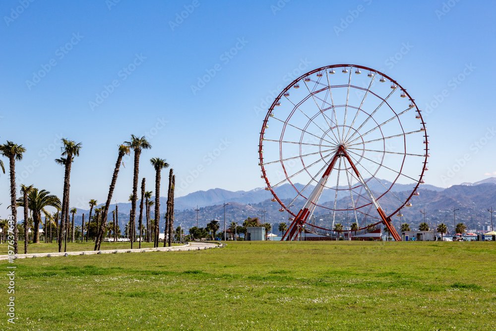 BATUMI, GEORGIA - MARCH 17, 2018: Ferris wheel on the waterfront in Wonder Park. Wheel height about 55 meters
BATUMI, GEORGIA - MARCH 17, 2018: Ferris wheel on the waterfront in Wonder Park. Wheel height about 55 meters