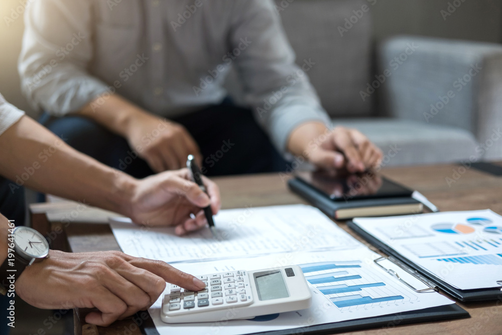Business team meeting working with new startup project, discussion and analysis data the charts and graphs. Digital tablet calculator, laptop computer using, Business finances and accounting concept Business team meeting working with new startup project, discussion and analysis data the charts and graphs. Digital tablet calculator, laptop computer using, Business finances and accounting concept