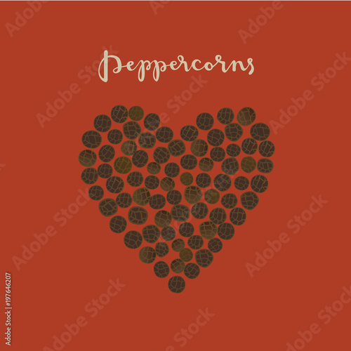 Black Peppercorns in a heart shape on the red background