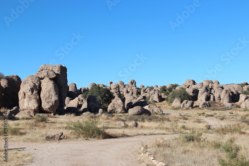 Large Rock boulders in desert with blue sky
