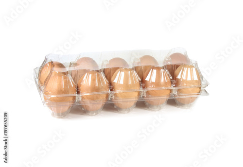 Chicken eggs in a plastic container