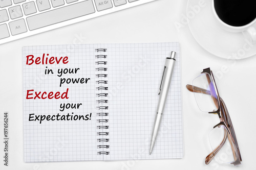 Fotografia Believe in your power Exceed your expectations text on notebook
