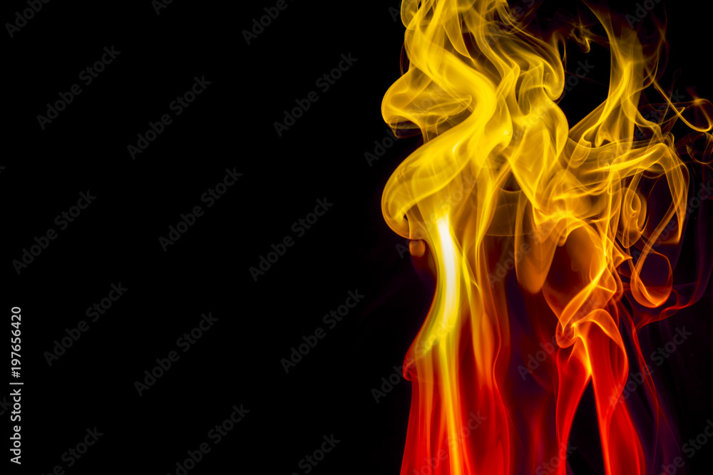 Fototapeta premium Colored smoke on black background