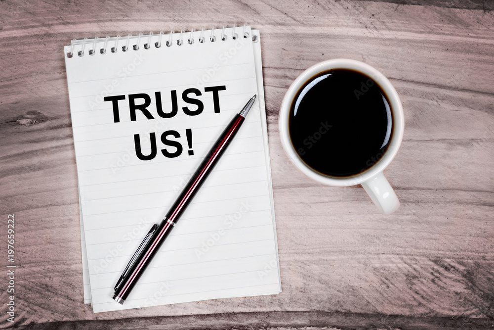 Trust us words on notebook Trust us words on notebook