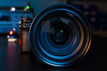 Photo Camera or Video lens close-up on black background DSLR objective