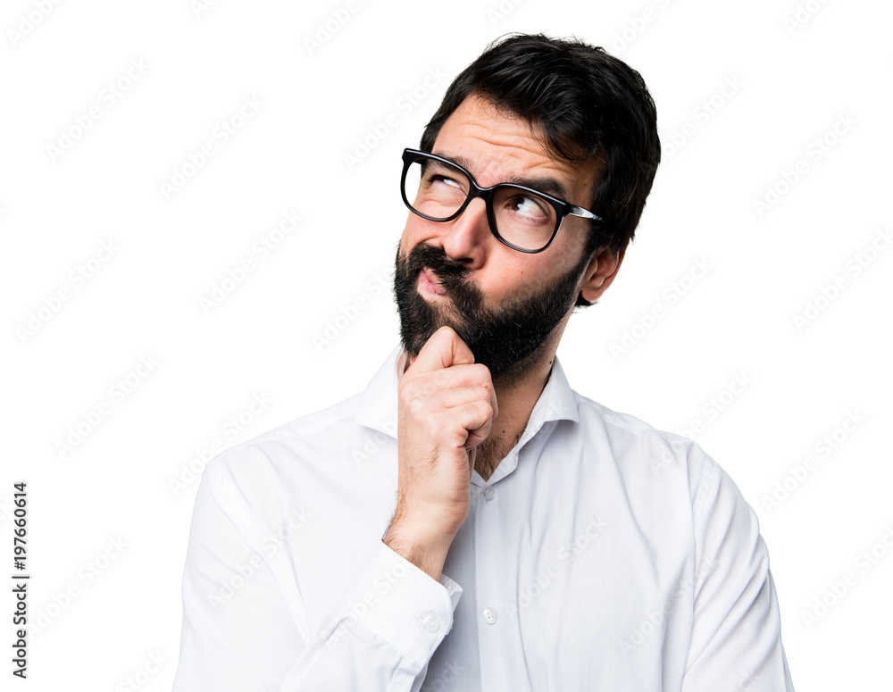 Handsome man with glasses thinking Handsome man with glasses thinking