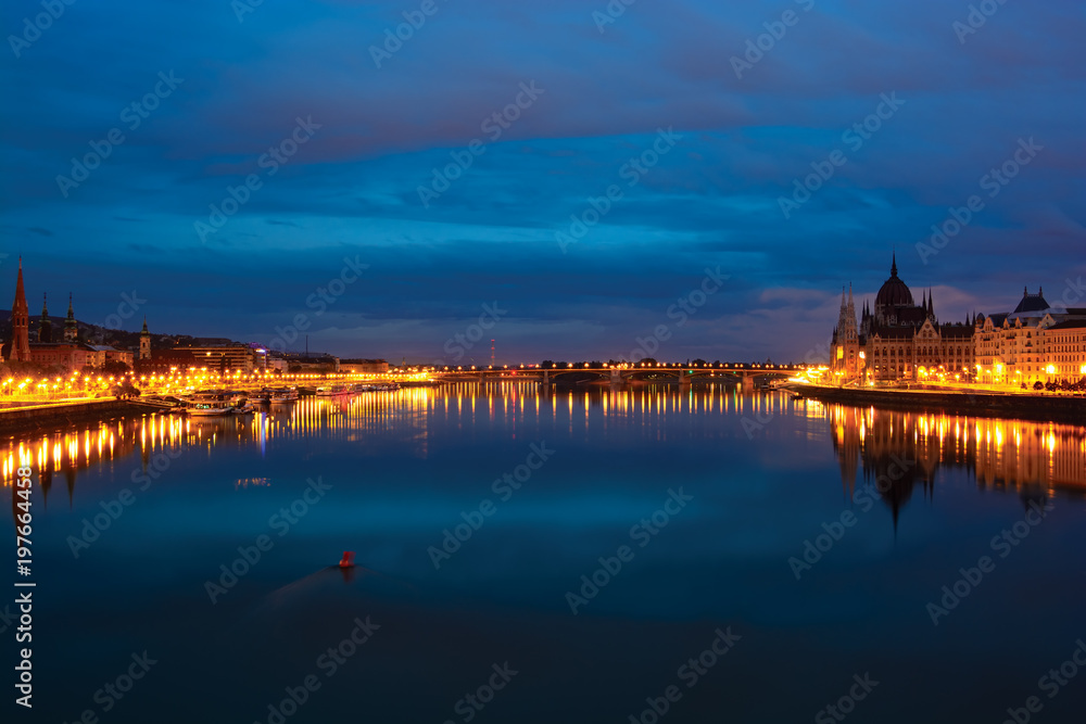 Deep blue Danube river at night, highlighted shores. Budapest. Hungary