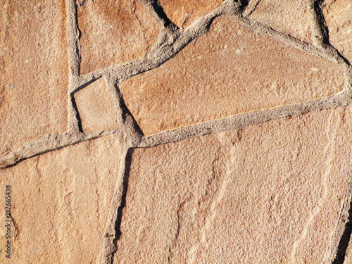 Fotografie Facing stone for exterior decoration of facades and socle of buildings, for interior decoration of walls, columns, fireplaces and other interior details