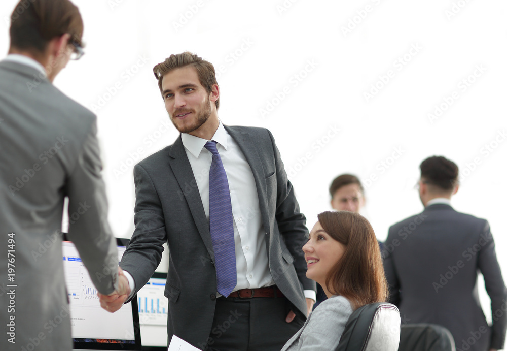 Business people shaking hands, finishing up a meeting Business people shaking hands, finishing up a meeting