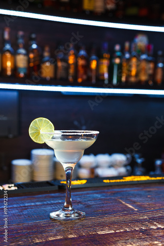 Fresh alcohol coctail on bar counter 
