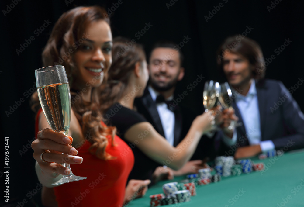 Girl drinking cocktail in casino