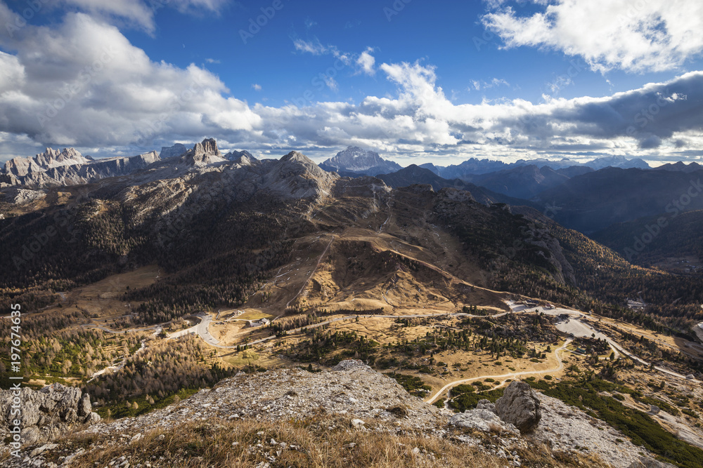 Scenic view of Passo Falzarego against cloudy sky Scenic view of Passo Falzarego against cloudy sky