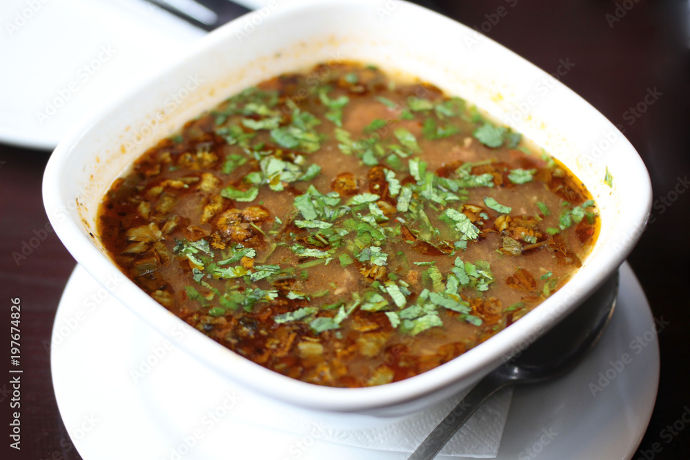 traditional Georgian soup Harcho with greens traditional Georgian soup Harcho with greens