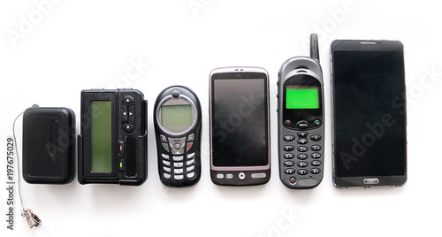 Konstfotografi Old mobile phones and pagers isolated on white background