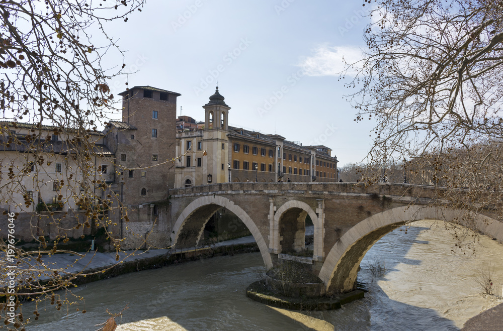 bridge over the Tiber river to Tiber island, Rome