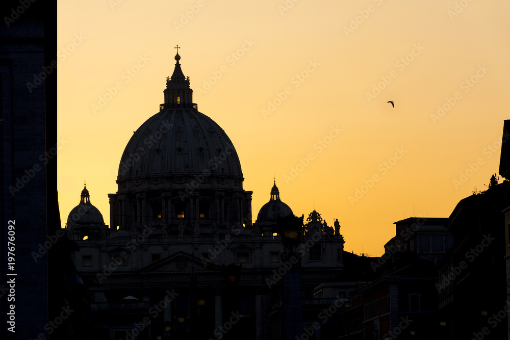 view of the temple of St. Peter in Rome at sunset