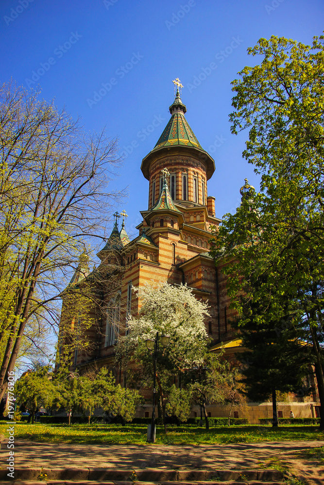 Back view of the Orthodox Metropolitan Cathedral from the nearby park in Timisoara, Timis County, Romania Back view of the Orthodox Metropolitan Cathedral from the nearby park in Timisoara, Timis County, Romania