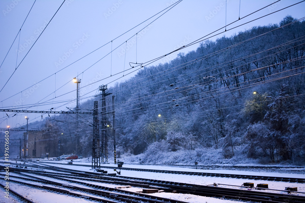 Winter morning landscape with snow, railway and forest Winter morning landscape with snow, railway and forest