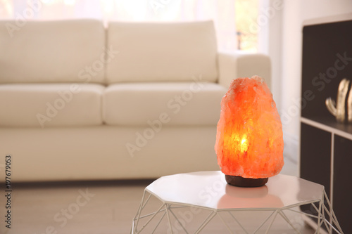 Himalayan salt lamp on tabl...