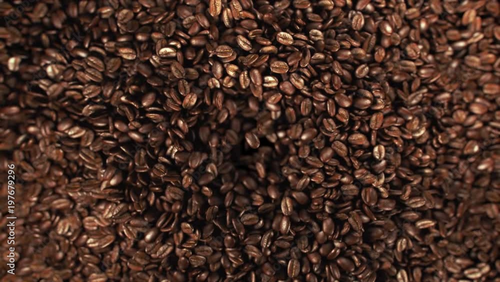 Coffee beans jumping in super slow motion 4K Coffee beans jumping in super slow motion 4K