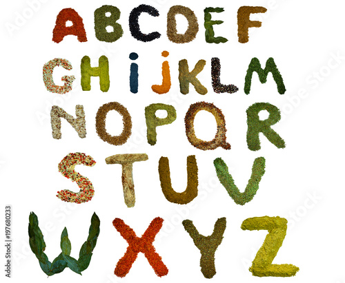  the whole isolated English alphabet lined with a variety of colorful and fragrant spices and flavouring
