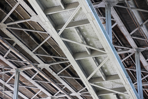 Metal bridge construction, overpass. Bottom view