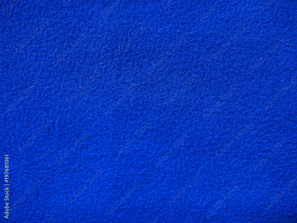 Fleece background, color royal blue. Terry cloth. Blanket of furry fleece  fabric. Texture of light blue soft plush material Stock Photo