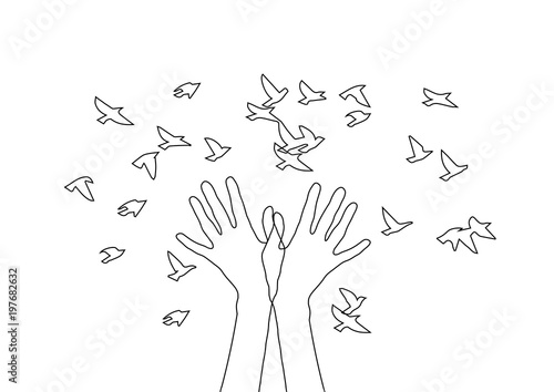 Hands releasing a flock of birds.