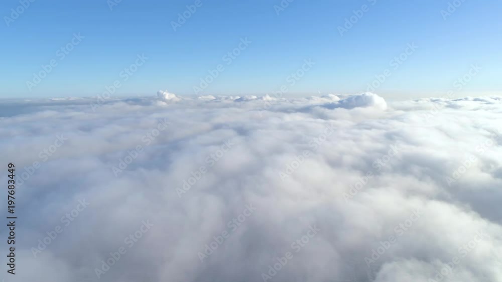 Winter drone shot above the clouds of the Minsk city snow sunny day residential buildings aerial Winter drone shot above the clouds of the Minsk city snow sunny day residential buildings aerial