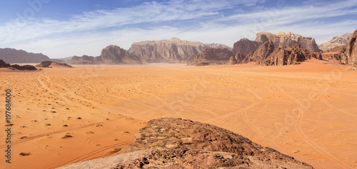 view to desert valley from peak in Jordan