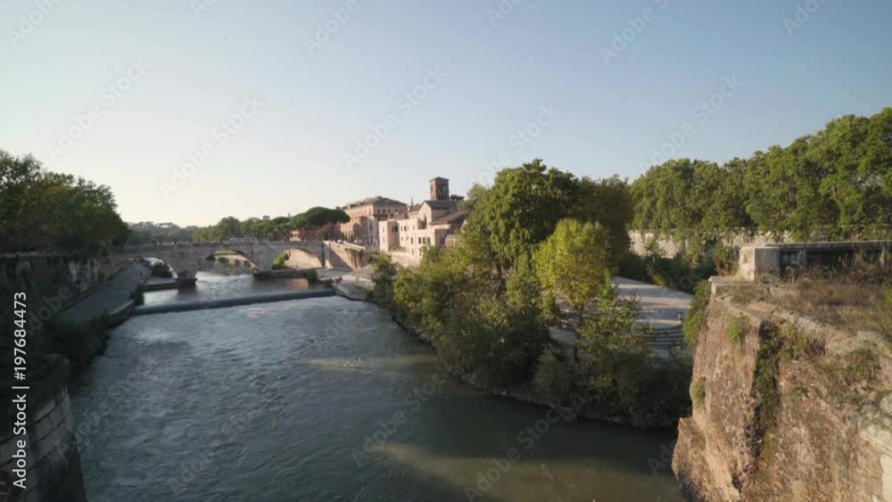 Beautiful view of the Tiber River in Rome's city centre during a sunny summer day Beautiful view of the Tiber River in Rome's city centre during a sunny summer day