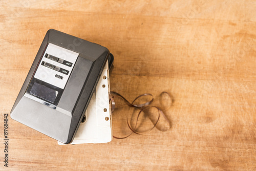 Wallpaper Mural Personal stereo and cassette tape on a wooden board Torontodigital.ca