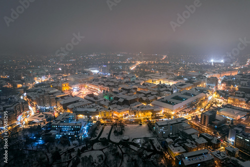 Winter night aerial view from Timisoara taken by a professional drone in the snow. Snow-covered historic center of the city