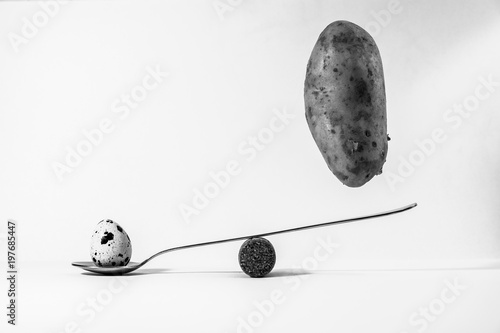 Egg, spoon and potato