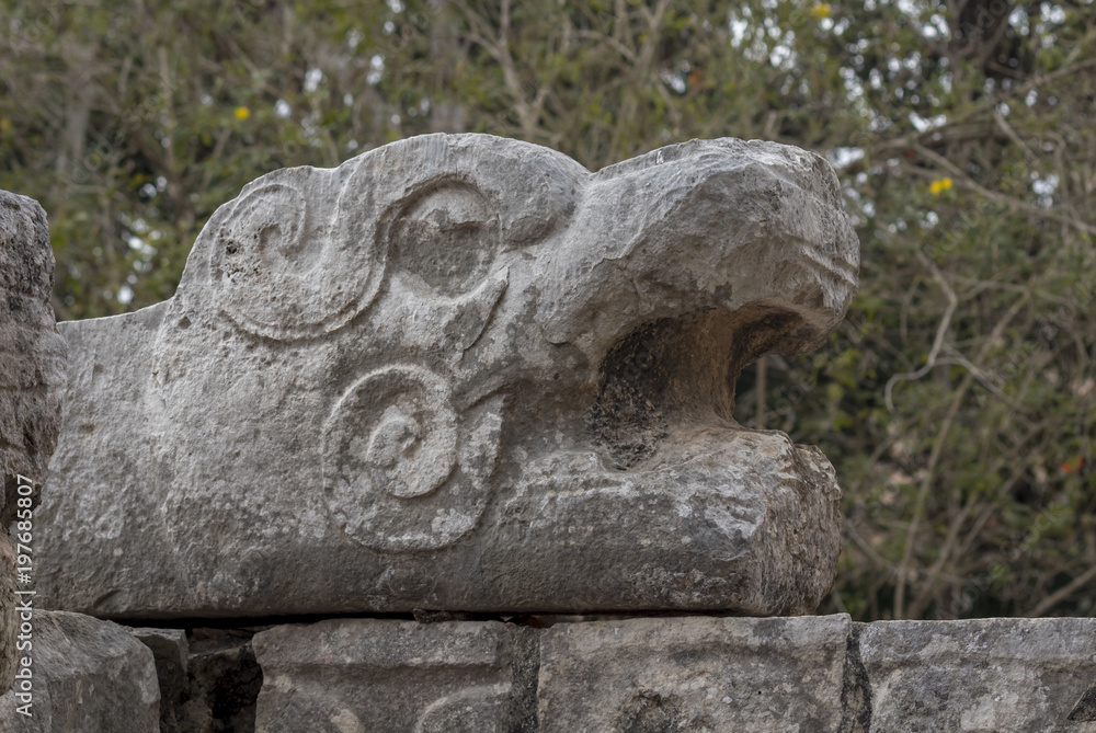 Kukulkan head detail showing fangs and tongue. This mayan deity, the feathered Snake, joins heaven and earth twice a year on Spring and autumn equinox. 