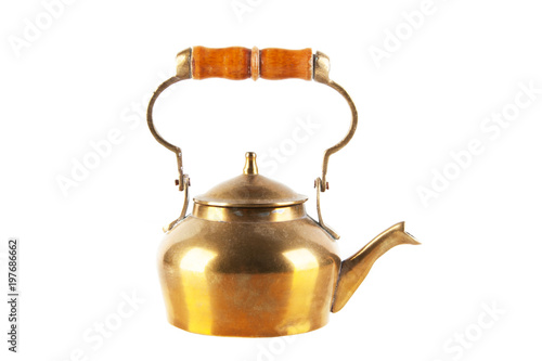 Vintage brass teapot isolated on white