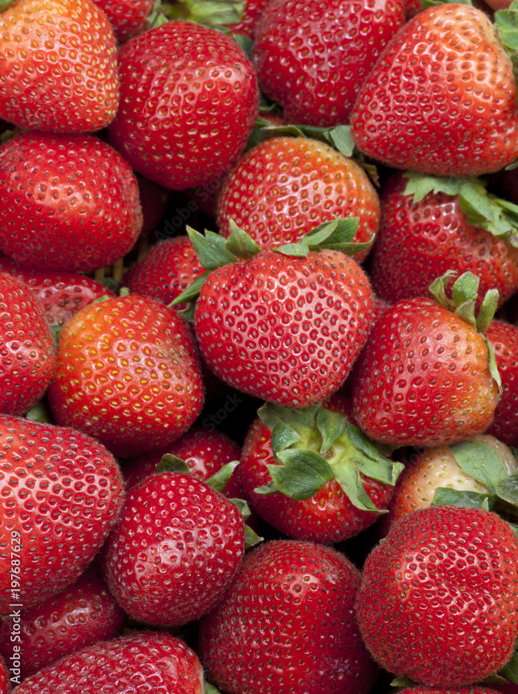 Group of Fresh Stawberries Background with Leaves Group of Fresh Stawberries Background with Leaves