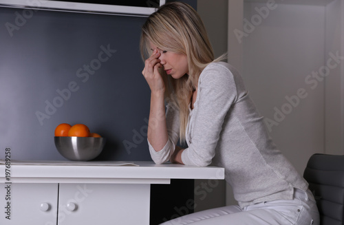 Woman suffering from headache, migrain photo